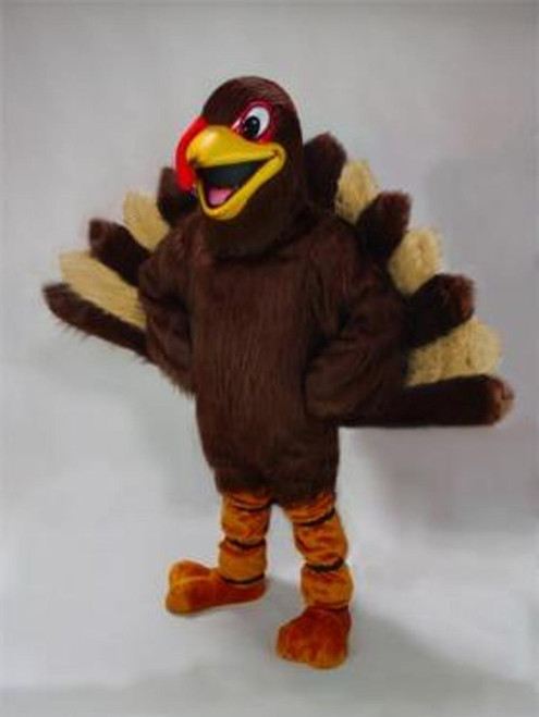 Mask US Turkey Mascot Costume (Rental), a plush turkey mascot costume with a large colorful beak, happy eyes, and feathers in brown, beige, and orange, suitable for events and performances.