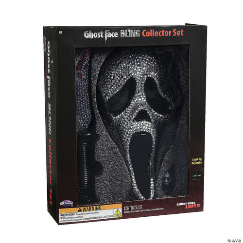 Fun World Ghost Face® Bling Mask, Knife & Light-Up Keychain Collectible Box Set, featuring a sparkling skull mask, a small knife, and a light-up keychain arranged inside a black display box.