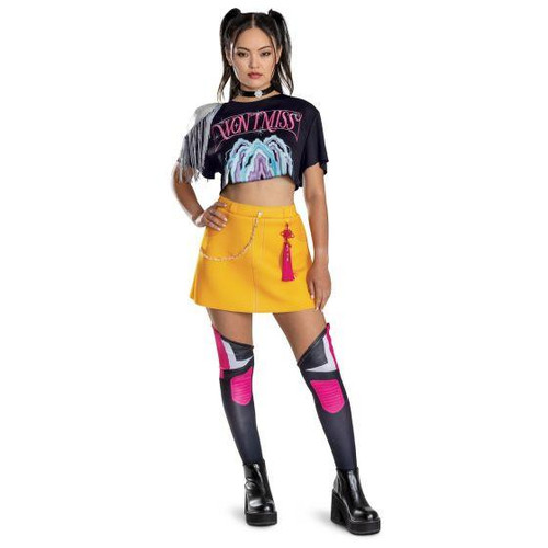Disguise KPop Demon Hunters™ Mira Hero Look Deluxe Costume - Adult, female model wearing a black graphic crop top with the word 'WOMAN' and colorful design, yellow mini skirt with pink tassel accessories, and thigh-high black and pink superhero-style tights with black platform boots.