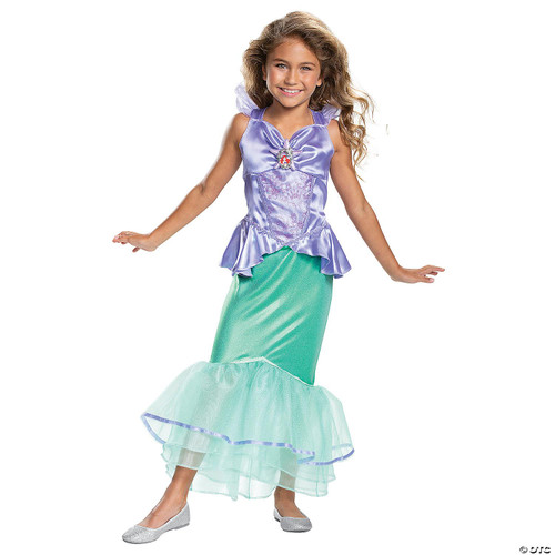 Disguise Ariel Classic Costume - Child, a young girl dressed as Ariel from The Little Mermaid, wearing a purple satin top with a seashell emblem, a green mermaid tail, and a light blue and purple layered tulle fin, smiling cheerfully.