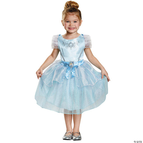 Disguise Cinderella Classic Costume- Child Toddler, young girl wearing a light blue princess Cinderella dress with puffy sleeves, glittery tulle skirt, and a satin bow at the waist with Cinderella emblem, smiling happily.