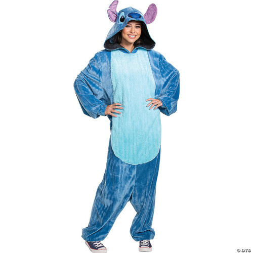 Disguise Stitch Deluxe Costume Adult, woman dressed in a blue Stitch plush onesie costume with a hood featuring Stitch's face and ears, suitable for cosplay and Halloween parties.