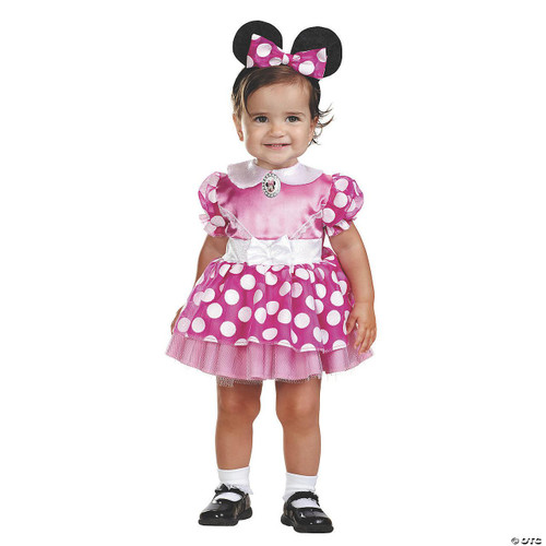 Disguise Pink Minnie Classic Costume 12-18 Months, a toddler girl dressed in pink Minnie Mouse-themed costume with polka dots, bow detail, and Minnie Mouse ears headband.