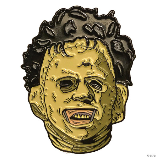 Trick or Treat Studios Leatherface Enamel Pin - The Texas Chainsaw Massacre, featuring a detailed illustration of Leatherface's menacing face with stitched skin, dark hair, and a chainsaw blades incorporated into the design.