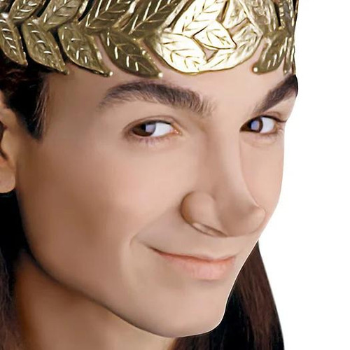 Woochie Pixie Nose Latex Appliance, close-up image of a realistic latex fantasy nose worn around a person's face.