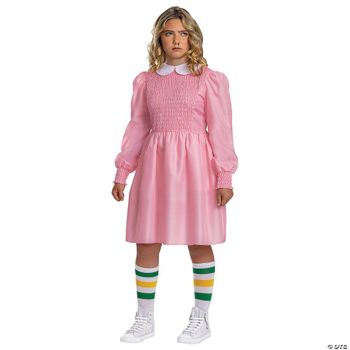 Disguise Stranger Things Eleven Pink Dress Classic Costume- Child, girl wearing a pink vintage-style dress with smocking detail, puffed long sleeves, a white Peter Pan collar, striped knee-high socks, and white sneakers, suitable for Halloween or costume parties.