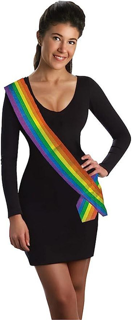 Forum Rainbow Sash, a colorful rainbow sash worn diagonally across a woman's black dress for LGBTQ+ pride and awareness.