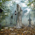 Seasonal Visions Wailing Phantom Animated Halloween Decoration, eerie haunted forest scene with a ghostly figure holding a lantern among tombstones and skeletons.