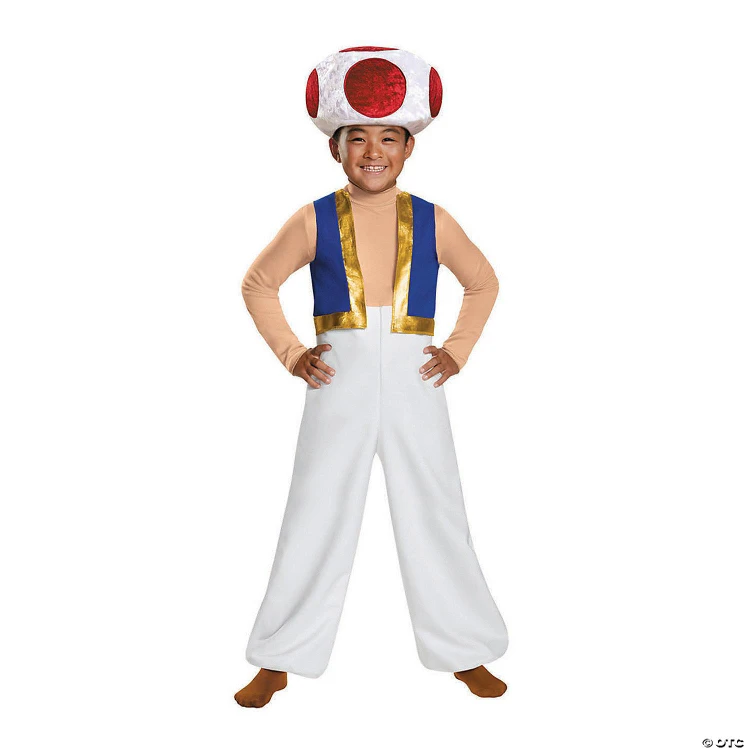 Disguise Super Mario Bros.™ Toad Deluxe Costume Child, child boy wearing Toad costume with large mushroom headpiece, blue vest with gold trim, beige long-sleeve shirt, and white pants, smiling.