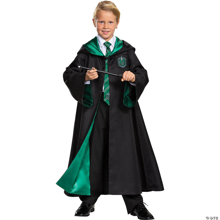 Disguise Harry Potter Slytherin Robe Prestige - Child, a young boy dressed in a Harry Potter Slytherin costume including a black robe with green lining, a Slytherin crest, a white shirt, green striped tie, and holding a wand.