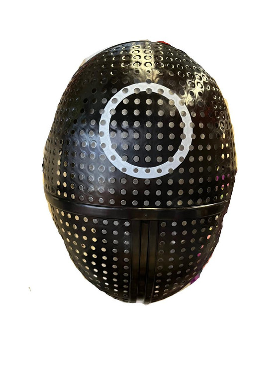 Fantasy Costumes Competitor Circle Mask, black plastic helmet with perforated holes and white circle design on top.