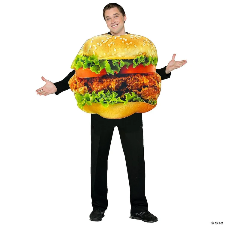 Rasta Imposta Chicken Sandwich Adult Costume, person wearing a large, realistic-looking chicken sandwich costume with lettuce, tomato, fried chicken patty, and sesame seed bun, suitable for themed parties and events.