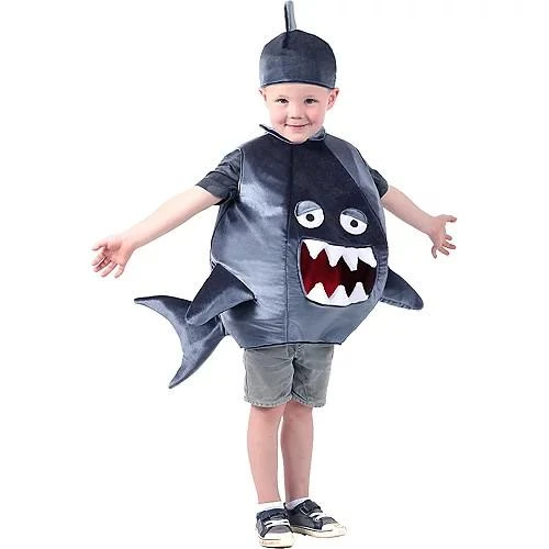 Ptincess Paradise Child's Feed Me Shark Costume, a young boy dressed in a shark costume featuring a large shark face with teeth, eyes, and fins, suitable for fun dress-up or Halloween.