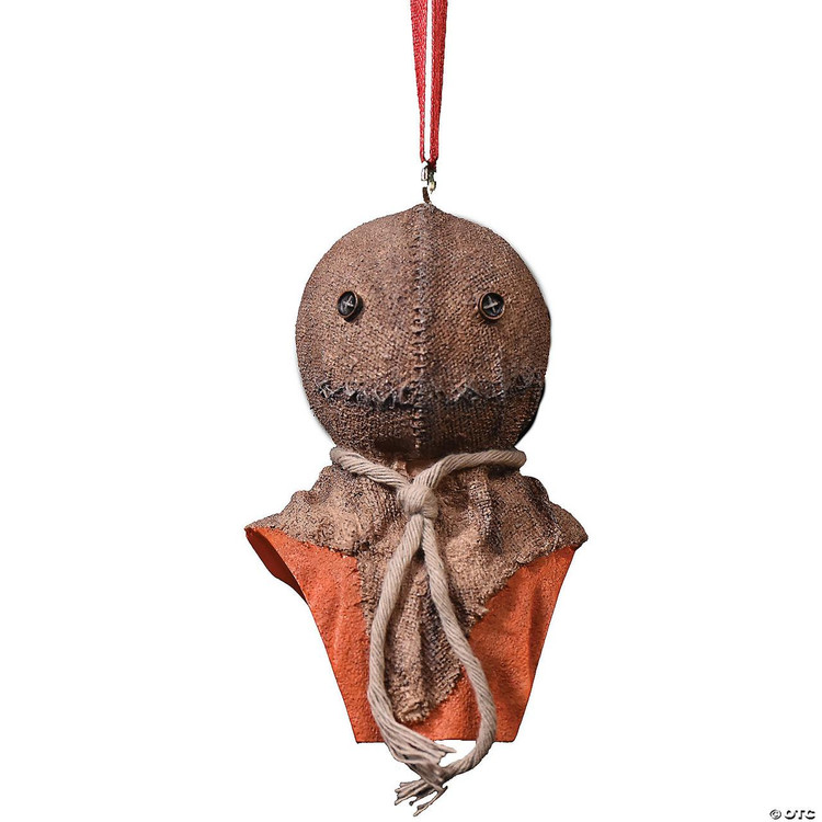 Trick or Treat Studios Sam Ornament - Trick 'R Treat, Halloween themed ornament resembling Sam from the movie with a textured brown spherical head, black button eyes, a burlap face mask, and an orange outfit with a beige tied scarf.