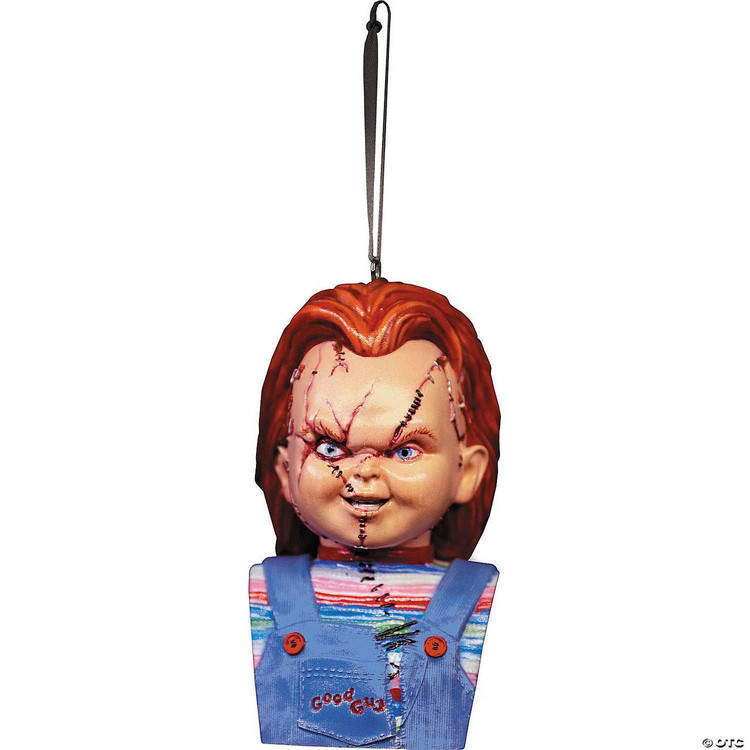 Trick or Treat Studios Seed Of Chucky Bust Ornament, detailed horror-themed collectible featuring Chucky's doll head with stitched scars, intense blue eyes, and red hair, hanging by a black strap.