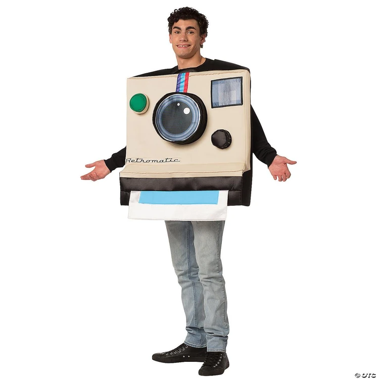 Rasta Imposta Instant Camera Costume, person wearing a large, box-shaped costume designed to look like a vintage instant camera with colorful buttons and a printed camera lens.