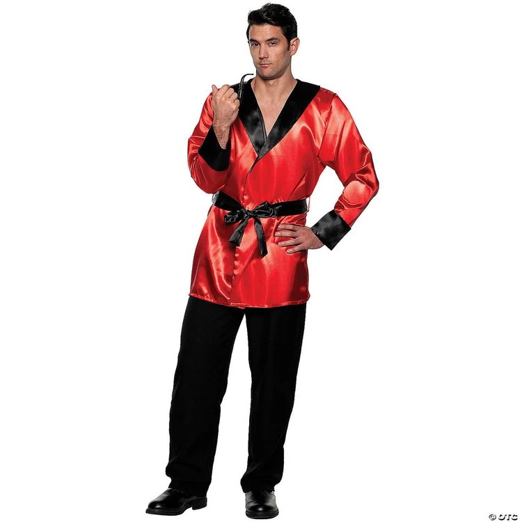 Underwraps Smoking Jacket Satin - Adult, a man wearing a red and black satin smoking jacket with a black belt and black pants, posing confidently.