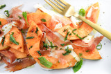 ​Grilled Cantaloupe Salad with Prosciutto, Fresh Mozzarella, and Mint