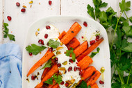 Roasted Carrots with Pistachios, Pomegranate, Parsley, and a Spicy Crema