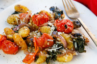 Crispy Sheet Pan Gnocchi with Tomatoes, Mushrooms, and Kale