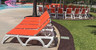 Grosfillex - Jamaica Beach Orange With White Frame Stacking Chaise Lounge (16 Pack)