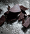 Broken pieces of Zokoko x Two Good dark chocolate bar with sea salt visible