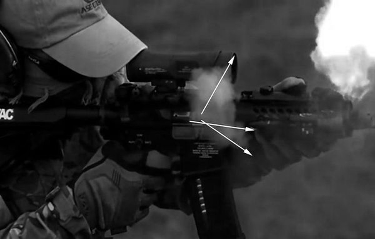 Design: Lantac E-BCG. - In this example excess lubricant has been used to demonstrate how the E-BCG directs gas forwards away from the operator. Design: Lantac E-BCG. - In this example excess lubricant has been used to demonstrate how the E-BCG directs gas forwards away from the operator.