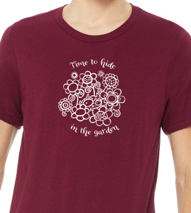 Close-up of hidden monster illustration tucked inside decorative flowers.