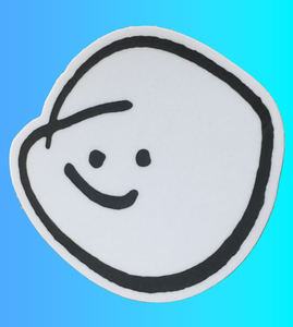 A simple black and white hand-drawn smiley face with a rounded outline and small eyes.