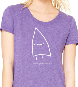 Close-up of minimalist triangle monster design with the phrase Only Good Vibes.