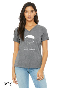 Model wearing grey funny philosophy graphic t-shirt that says “bad case of the human condition.” on Bella Canvas women's relaxed v neck.