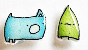 Handmade monster earrings tiny character studs explaining interaction small quirky jewelry Portland handmade.
