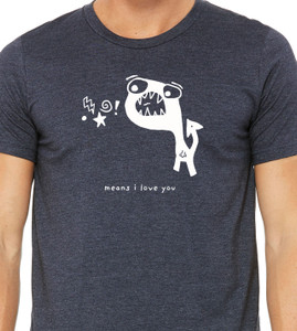 Close-up of cute angry monster illustration with text “means i love you” printed on soft navy graphic tee.
