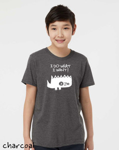 Model wearing white funny monster graphic t-shirt that says “I Do What I Want!" on a charcoal youth tee.