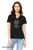 Woman wearing solid black Keep It Together monster t-shirt with wide-eyed character and repeating mantra text.