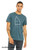 Model wearing minimal monster graphic t-shirt with triangle character and Only Good Vibes text.