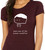 Close-up of simple hand-drawn character illustration with humorous existential phrase on maroon tee.
