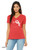 Model wearing  cute angry monster illustration with text “means i love you” printed on soft red graphic tee.