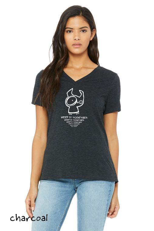 Woman wearing charcoal Keep It Together monster t-shirt with wide-eyed character and repeating mantra text.