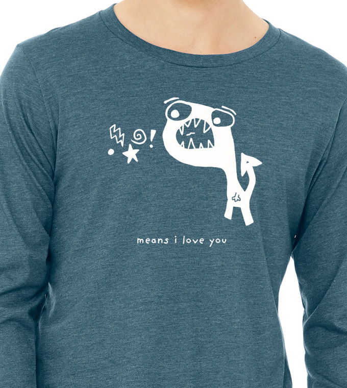 Close up of man  wearing Rawr Means I Love You monster long sleeve tee with bold white illustration.