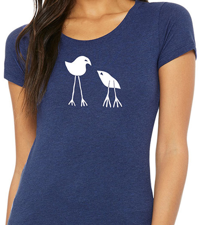 Close up of woman wearing minimalist two birds t shirt parent and baby bird simple graphic design.