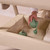 TUTTI BAMBINI COZEE AIR 2 BEDSIDE CRIB - TOASTED OAK/SAND