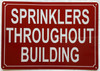 SPRINKLERS THROUGHOUT BUILDING COMPLIANCE SIGN