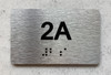 APT# 2A SILVER Braille Sign