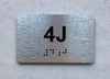 APT# 4J SILVER Braille Sign