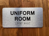 The Uniform Room Compliance Sign