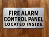 The Fire Alarm Control Panel Located Inside Compliance Sign