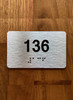 Apartment number 136 Ada Sign