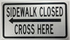 SIGNS SIDEWALK CLOSED, CROSS HERE