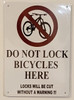 SIGNS DO NOT LOCK BICYCLE